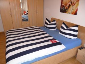 
Ein Bett oder Betten in einem Zimmer der Unterkunft Apartments Residenz am Ryck - Nähe UNI und Kliniken
