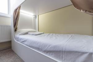 Postel nebo postele na pokoji v ubytování hi Hostel