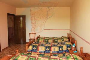Postel nebo postele na pokoji v ubytování Agriturismo La Praduscella