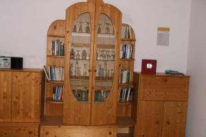 Knihovna v apartmánu + 8 fotografií