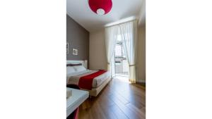 A bed or beds in a room at NovaNova