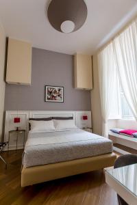 A bed or beds in a room at NovaNova