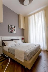 A bed or beds in a room at NovaNova