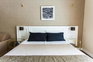 A bed or beds in a room at NovaNova