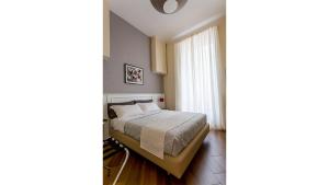 A bed or beds in a room at NovaNova
