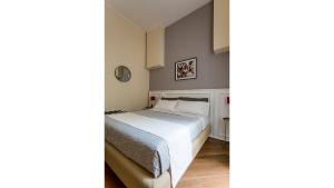 A bed or beds in a room at NovaNova