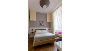 A bed or beds in a room at NovaNova