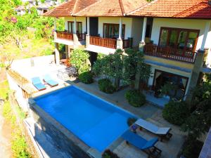 an aerial view of a house with a swimming pool at Anugerah Villas in Amed