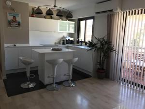 Kuchyň nebo kuchyňský kout v ubytování Appartement Residence Athena + 15 fotografií