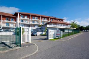 Photo de la galerie de l'établissement Séjours & Affaires Genève Gex Les Rives Du Léman, à Gex