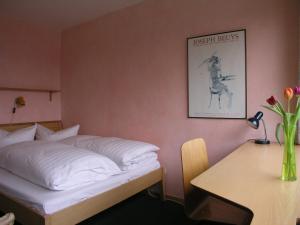Postel nebo postele na pokoji v ubytování Humboldt-Haus