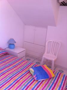 Rosa Marina Frontline Beach客房内的一张或多张床位