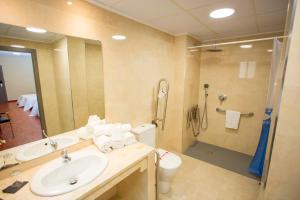 Koupelna v ubytování Hotel Borgia