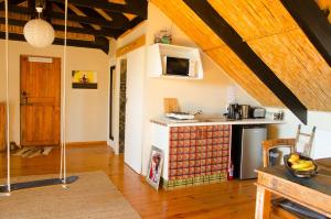 Kuchyň nebo kuchyňský kout v ubytování Sundowner Loft