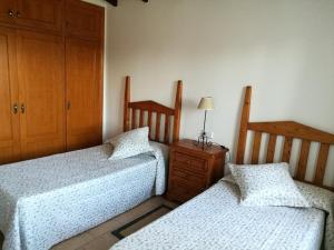 A bed or beds in a room at Son Set Villa