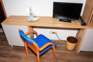 TV a/nebo společenská místnost v ubytování Hotel Zur Suhle