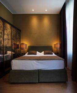 Llit o llits en una habitació de Aqua Apartments