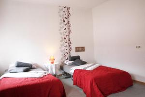 Postel nebo postele na pokoji v ubytování Ferienwohnung Ulrichstein/ Bobenhausen II