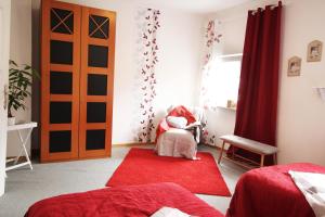 Postel nebo postele na pokoji v ubytování Ferienwohnung Ulrichstein/ Bobenhausen II