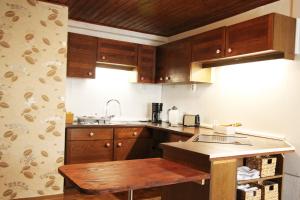 Kuchyň nebo kuchyňský kout v ubytování Ferienwohnung Ulrichstein/ Bobenhausen II