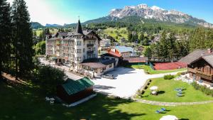 an aerial view of a town with a mountain at Franceschi Park Hotel in Cortina dʼAmpezzo