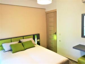 A bed or beds in a room at All Saints Villas