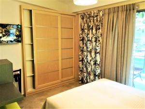 A bed or beds in a room at All Saints Villas