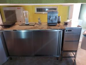 Kuchyň nebo kuchyňský kout v ubytování Villa Medusa Apartments
