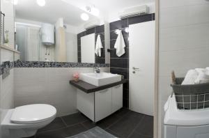 Koupelna v ubytování City getaway - apartment Ileora