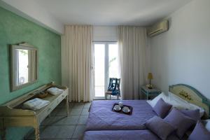 Afbeelding uit fotogalerij van Iason Hotel Apartments in Giosonas