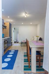 Ένα ή περισσότερα κρεβάτια σε δωμάτιο στο Apartment Arena
