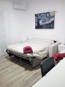Posteľ alebo postele v izbe v ubytovaní Casa Perennio
