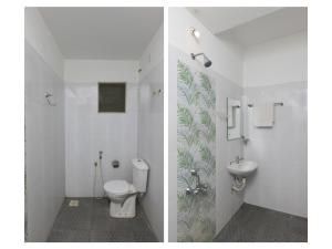 Koupelna v ubytování Maruthi Residency + 19 fotografií
