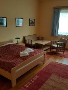 Łóżko lub łóżka w pokoju w obiekcie Grand Hotel