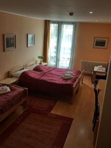 Łóżko lub łóżka w pokoju w obiekcie Grand Hotel