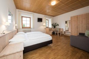 Postel nebo postele na pokoji v ubytování Hotel Masatsch
