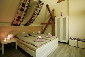 Postel nebo postele na pokoji v ubytování Penzion a relax centrum Andělka