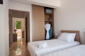 Cama ou camas em um quarto em Studios Angeliki