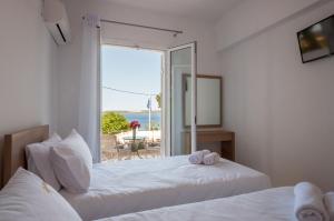 Cama ou camas em um quarto em Studios Angeliki