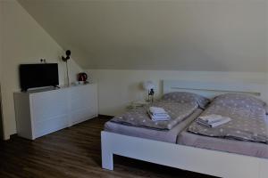 Postel nebo postele na pokoji v ubytování Penzion a relax centrum Andělka