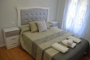 Tempat tidur dalam kamar di Apartamento Camino Laurel en Travesía Laurel Nº 6