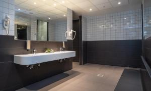 Koupelna v ubytování Thon Hotel Arena