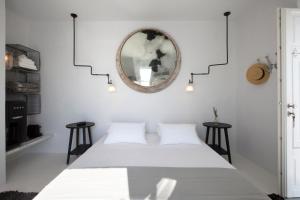 Letto o letti in una camera di Erosantorini Estate