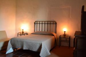 Uma cama ou camas num quarto em Convento de São Francisco