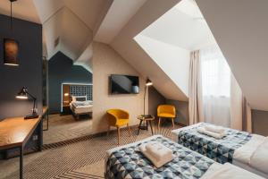 Posteľ alebo postele v izbe v ubytovaní Avena Boutique Hotel by Artery Hotels