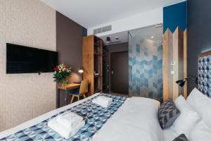 Posteľ alebo postele v izbe v ubytovaní Avena Boutique Hotel by Artery Hotels