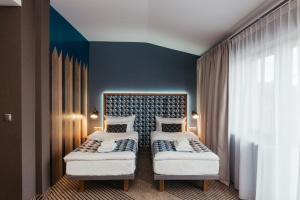 Posteľ alebo postele v izbe v ubytovaní Avena Boutique Hotel by Artery Hotels