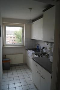 Ett kök eller pentry på Apartment Krefeld City