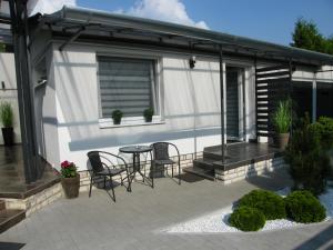 Patio alebo iná vonkajšia časť ubytovania Gyarmati Apartman