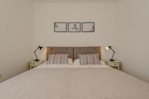 Posteľ alebo postele v izbe v ubytovaní Apartment Sun & Sea